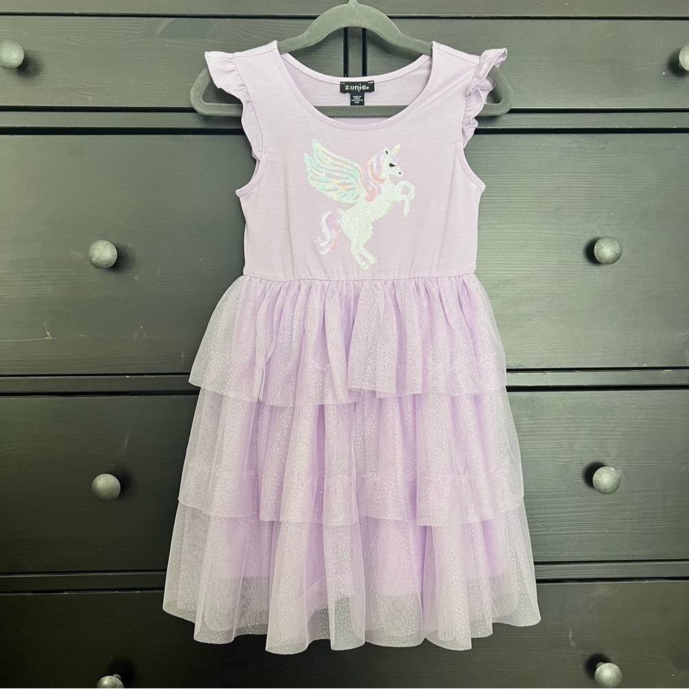 Purple ruffle dress with sequinned unicorn